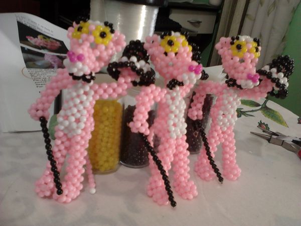 pantera cor de rosa com chapéu e bengala